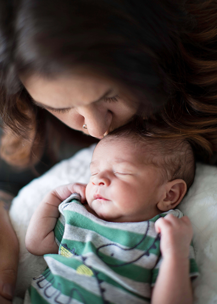 Stacey and baby Jaxon newborn photography shoot in home Airdire Alberta